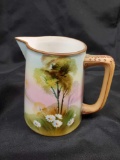 Antique hand painted Nippon pitcher with Moriage handle