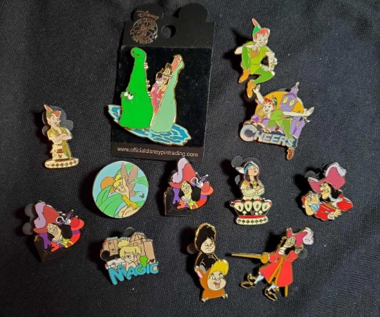 OFFICIAL DISNEY TRADING PINS GROUP, PETER PAN THEME, INCLUDING CROCODILE PIN ON BACKER BOARD