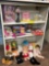Metal Shelf with contents- Cat in the Hat, Music Box, Puzzles, Baby Miss Piggy, Magic Pee Wee Mini