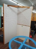 Large L shaped wooded room divider with pegboard