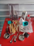 Kitchen grouping including new packaged knife set , and other kitchen essentials