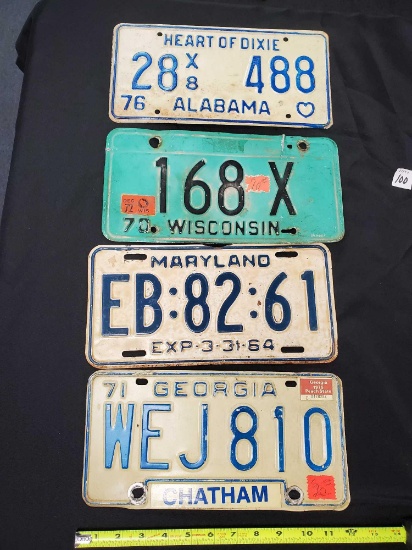 4 Vintage license plates including Georgia, Maryland, Wisconsin, Alabama