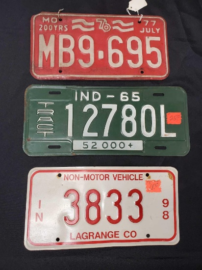 3 vintage license plates including bicentennial and tractor