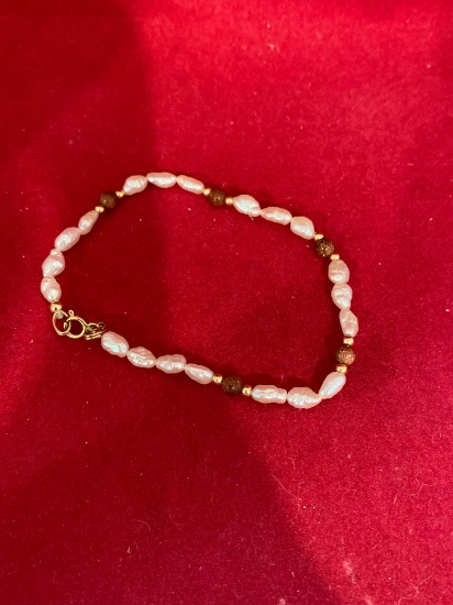 14k Pearl and sparkling red stone bracelet