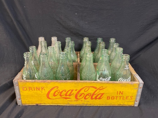 Vintage wooden Coca-Cola Crate full of 6 - 1/2 ounce Equally VINTAGE green Coca-Cola bottles.