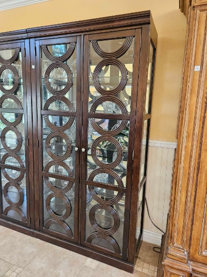 Stately Brown wood and glass display cabinet with wooden accents and touch hinged lighting