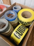 Box full of tape and caution tape