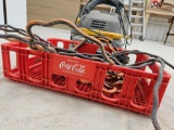 Small wet dry vac, electric cords and coke crate