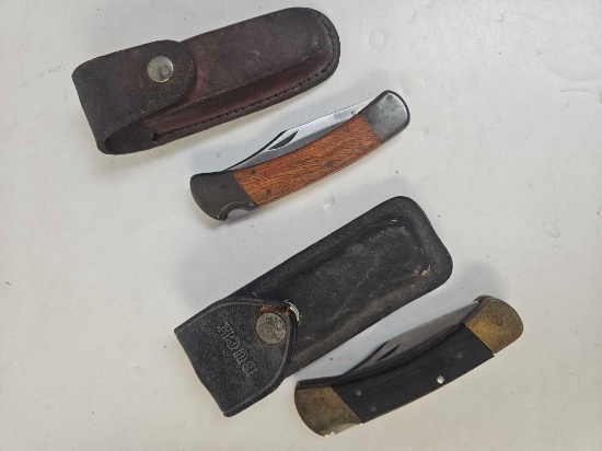 (2) VINTAGE 4in. KNIVES IN SHEATHS, including BUCK 110