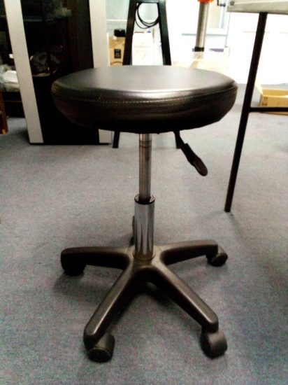 GET AROUND EASY AT WORK IN THIS ADJUSTABLE HEIGHT ROLLING STOOL