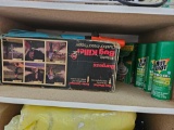 Unsearched shelf including Burgess electric bug killer and foggers