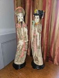 PAIR OF CARVED RESIN ORIENTAL COUPLE STATUES ON WOODEN BASES