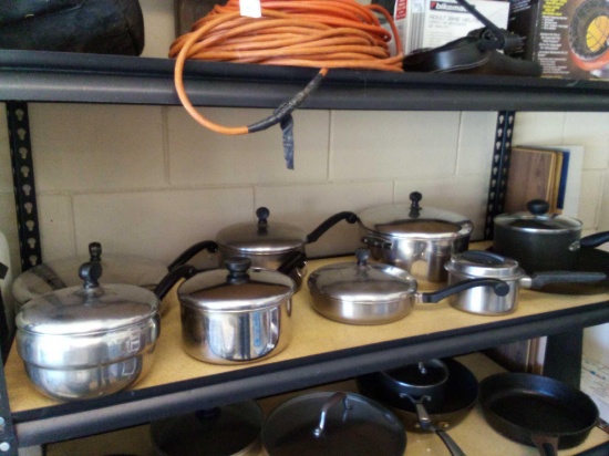 large group of stainless steel with some Teflon used pots and pans, farberware, Paul revere, Flint