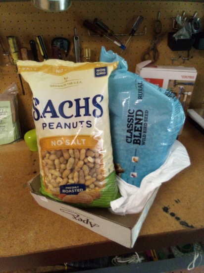 OPEN BAG OF CLASSIC BLEND WILD BIRD SEED AND SACHS PEANUTS squirrel food