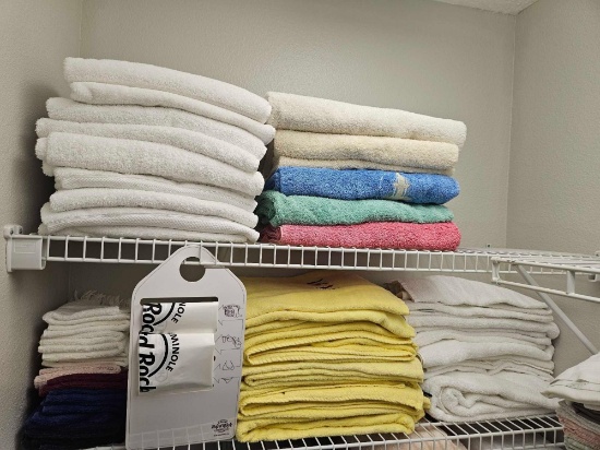 (2) Linen closet shelves of TOWELS including HARD ROCK HOTEL Laundry bags
