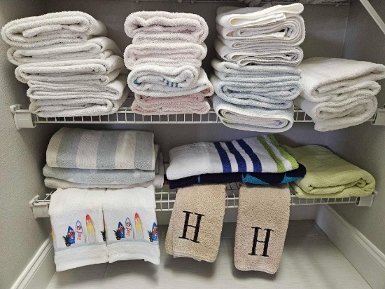 (2) Linen closet shelves of TOWELS including beach, H hand towels