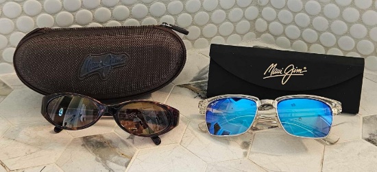 2 pairs of Maui Jim sunglasses in cases