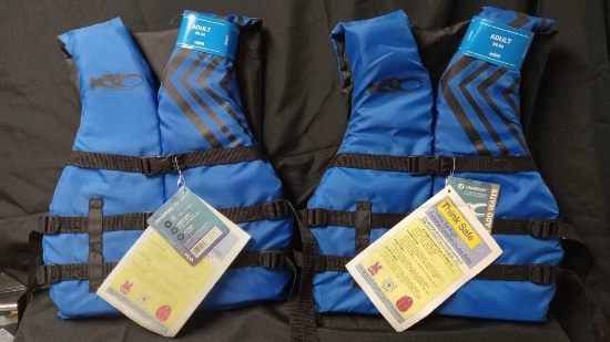 TWO UNIVERSAL ADULT LIFE VESTS, With tags