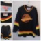 (2) Canadian Hockey Jerseys (1) New Vintage Nike Team Canada (1) Vancouver Canucks