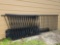 Outdoor metal fencing, 12 panels, approximately ten posts
