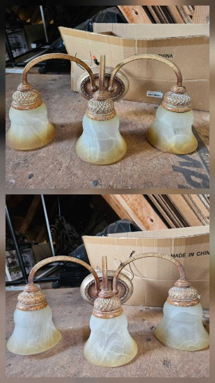 Pair of triple globe vanity lights