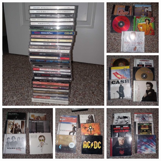 Lot of Music CDs including: AC/DC, Johnny Cash, Rod Stewart, Chicago