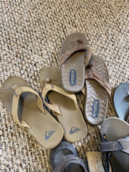 Grouping of mens flip flops and sandals