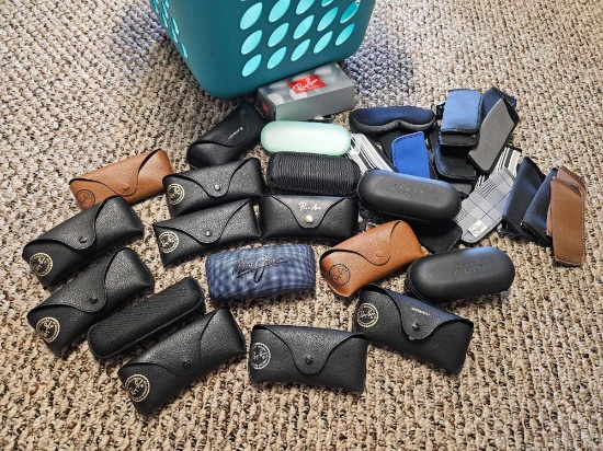 LAUNDRY BASKET OF EYEGLASS CASES INCLUDING RAY BAN, MAUI JIM, AND SOFT SLEEVES