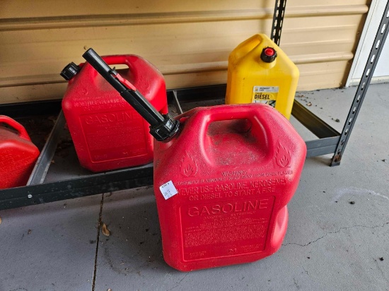 3 5-gallon gas cans including diesel