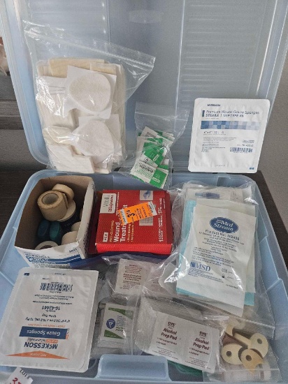 Tote of wound treatment, gauze comma padding and foot care items