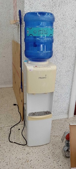 Primo Top Loading Water Dispenser with a Primo Purified Water bottle (empty)