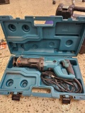 Makita JR3050T Variable Speed Reciprocating Saw in its hard case.
