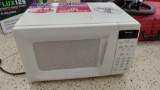 very mini Magic Chef countertop microwave oven
