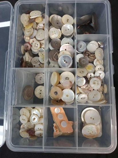 Tray of Vintage mother-of-pearl buttons, likely carved shell buttons