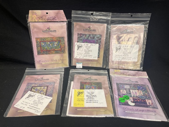Collection of Quilting patterns, specifically from the "Petals of My Heart" series by The Stitch-N