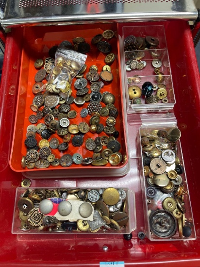 Collection of vintage and antique buttons, primarily made of metal