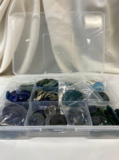 Blue and Green-tone Vintage Button Collection in Clear Section Containers, Varying Shapes and Sizes