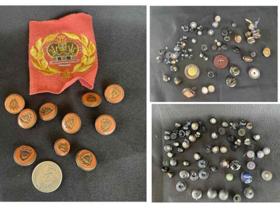 collection of vintage and antique buttons, likely a variety of materials and eras.