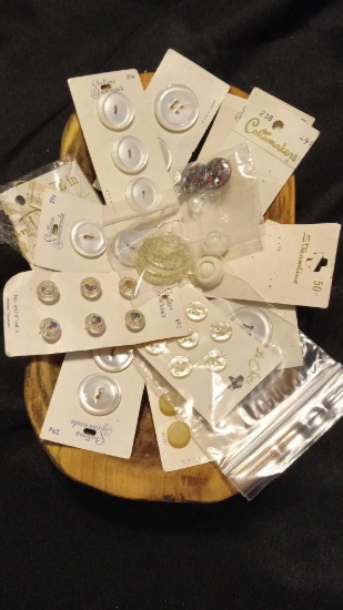 Cream and Pear-tone Vintage buttons on their original cards, likely from the 1930s or later