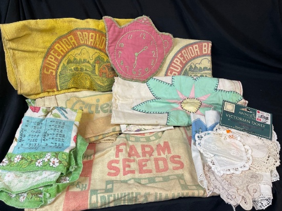 Collection of vintage and handmade textile items, including: Grain Sacks, Central States Seed