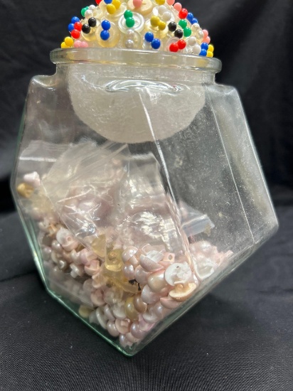 Glass Container of Pearly Buttons