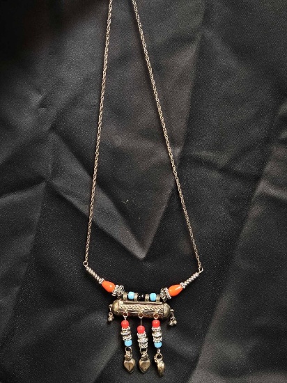 Traditional Yemeni silver necklace, coral beads and a central silver amulet box known as a Hirz.