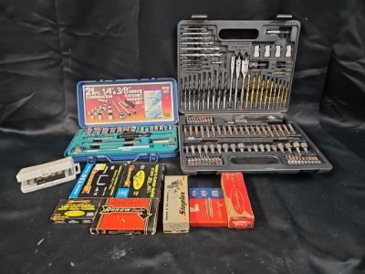 Drill bits galore in case, 1/4" & 3/8" ratchet set, staples and more