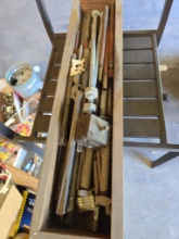 Long Wooden box filled with vintage metal hardware, including threaded bolts, nuts,