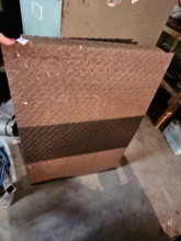 heavy-duty piece of diamond plate (also known as tread plate or checkered plate)