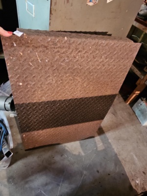 heavy-duty piece of diamond plate (also known as tread plate or checkered plate)
