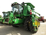 9760 STS JD, 20.8x42 duals, 4 wh., spreader, 1973 hrs., 2005 yr., SN 711857