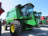 9500 JD 305x32 R1, 2 wh. drive, 14.9x24, chaff spreader, SN 665476, 3235 hrs