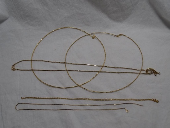 Four Gold Necklaces