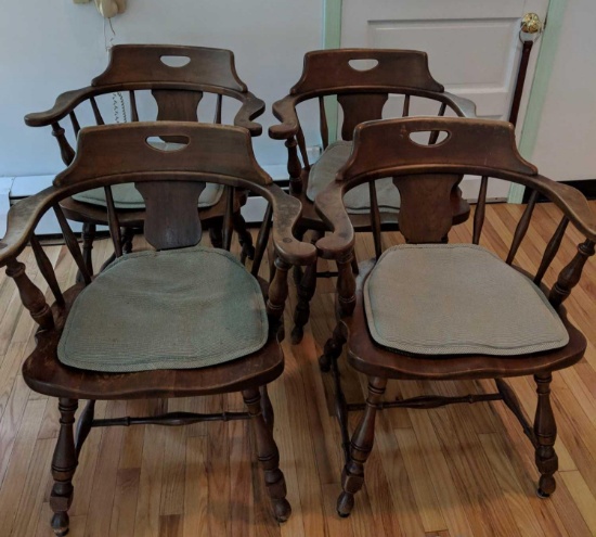 Four kitchen Captains chairs
